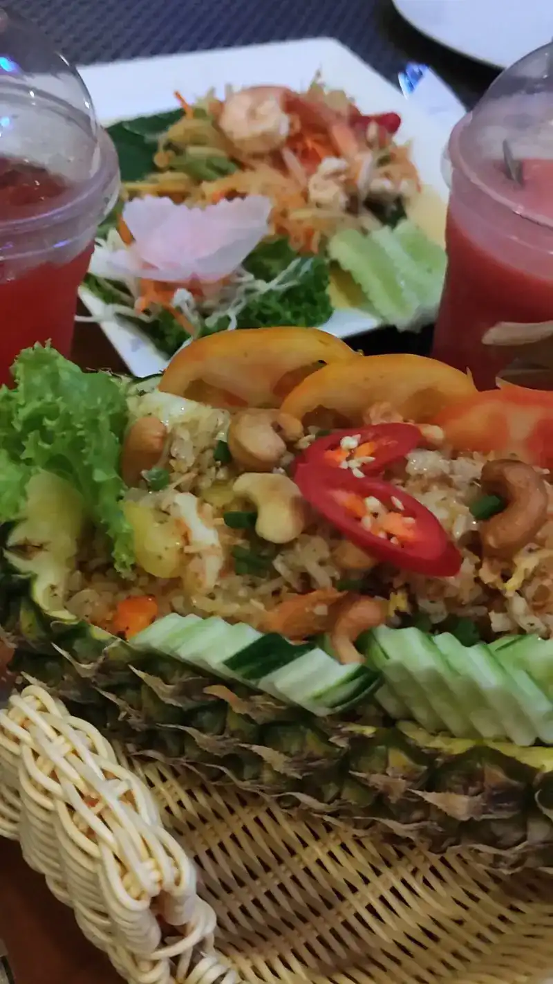 Fried rice with cashew nuts and chilli served in a pineapple