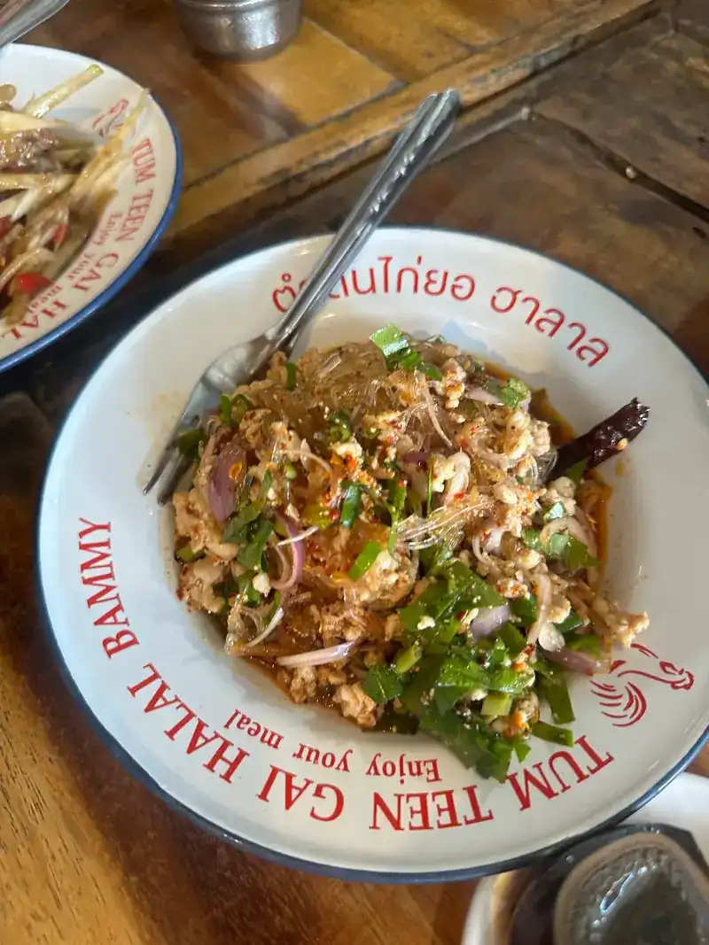 Glass noodle salad on the shop's own printed plate