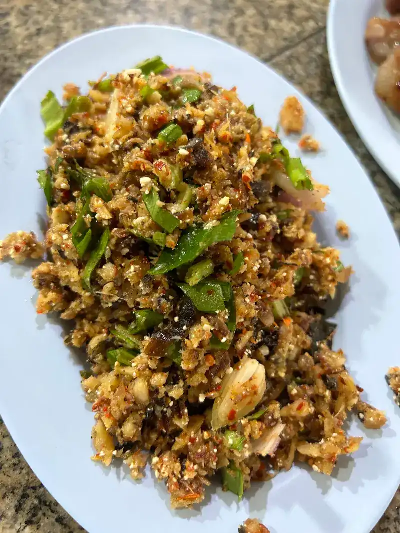 A crumbly larb with spring onion and herbs