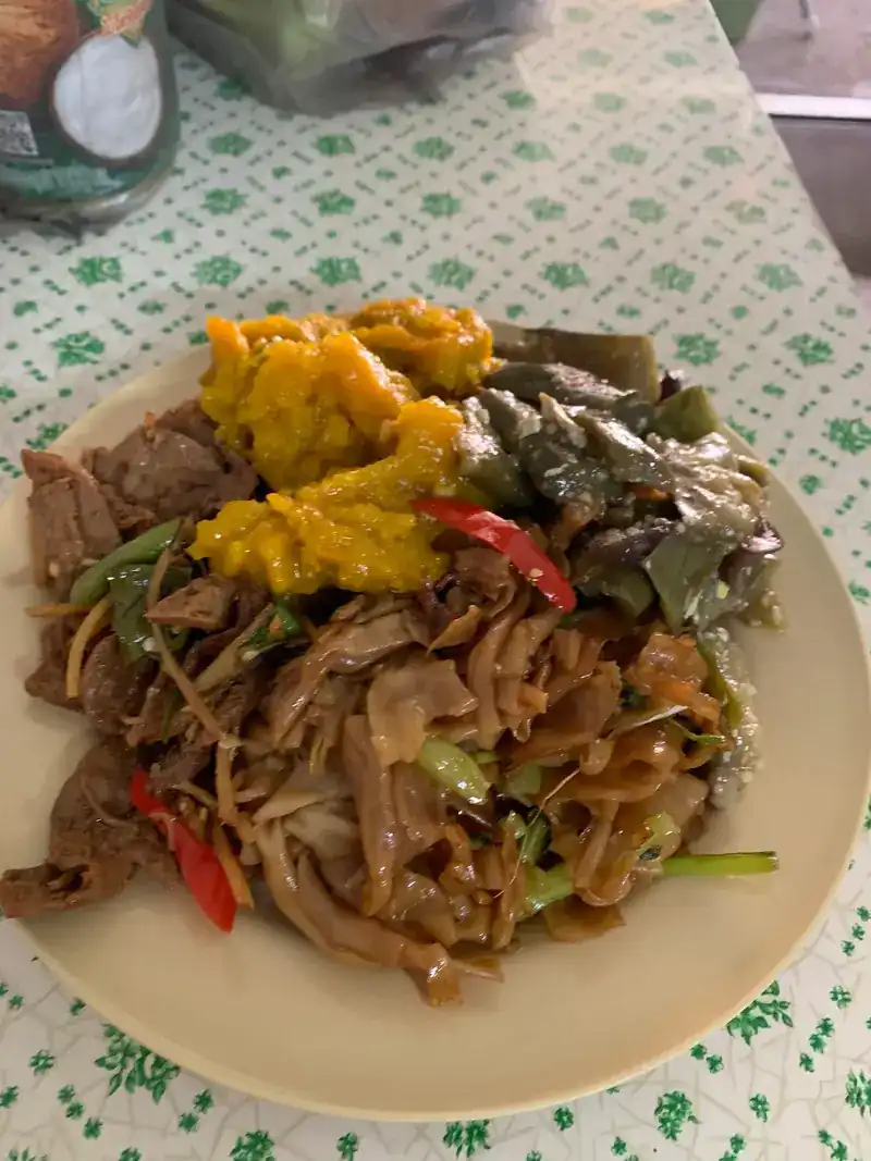 Stir-fried wide noodles with vegetables from the trays