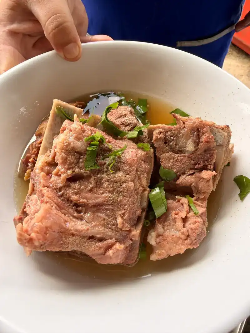 Rib on the bone in a clear broth