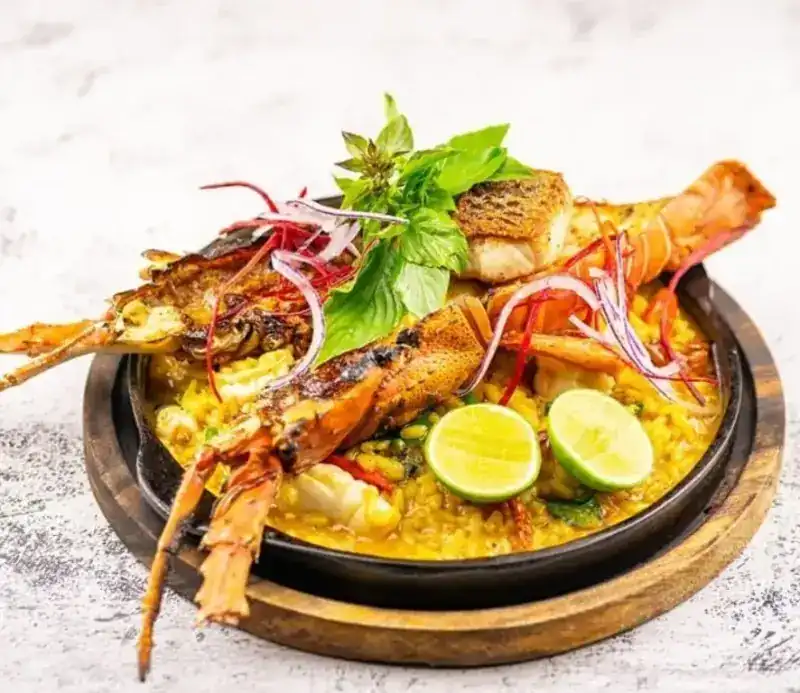 Phuket paella in an iron pan