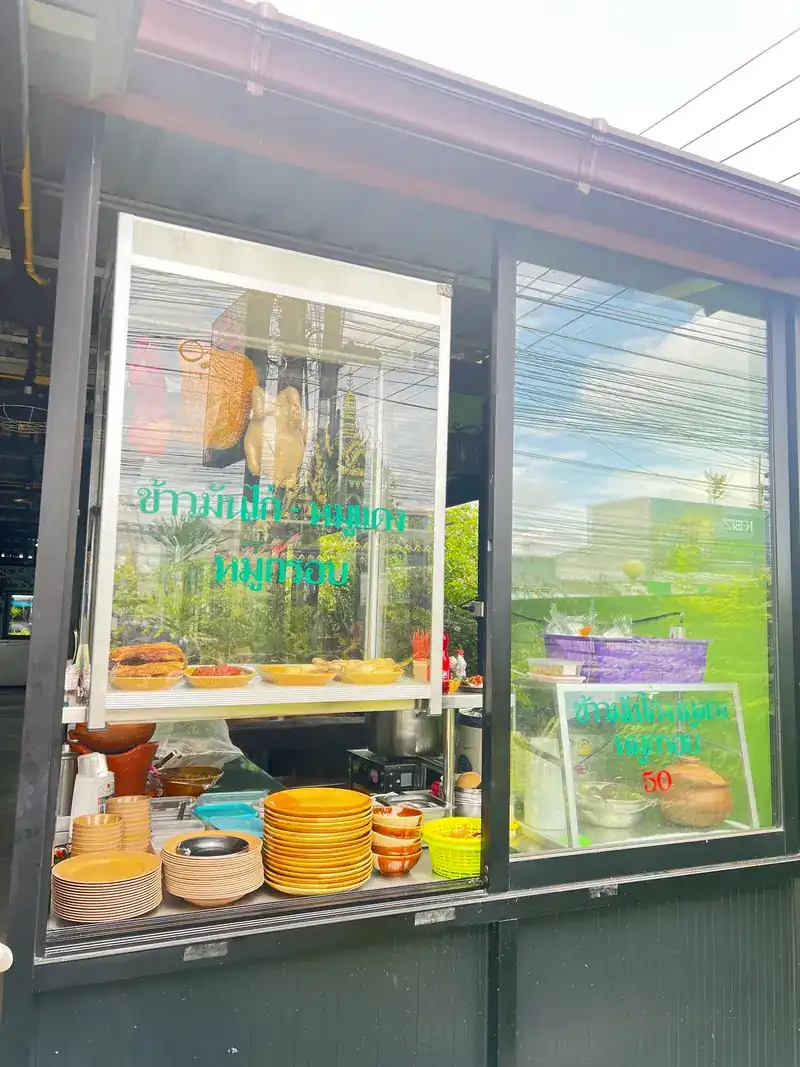The glass-fronted kitchen counter at the front of the shop