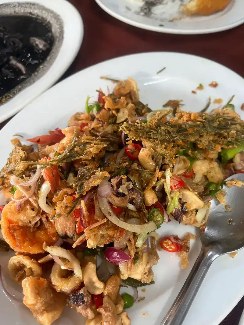 Fried squid and prawns tossed with chilli, onion and crisp fried herbs