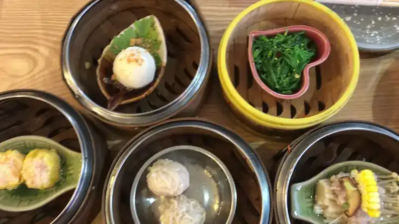 Dim sum in bamboo steamers, close up